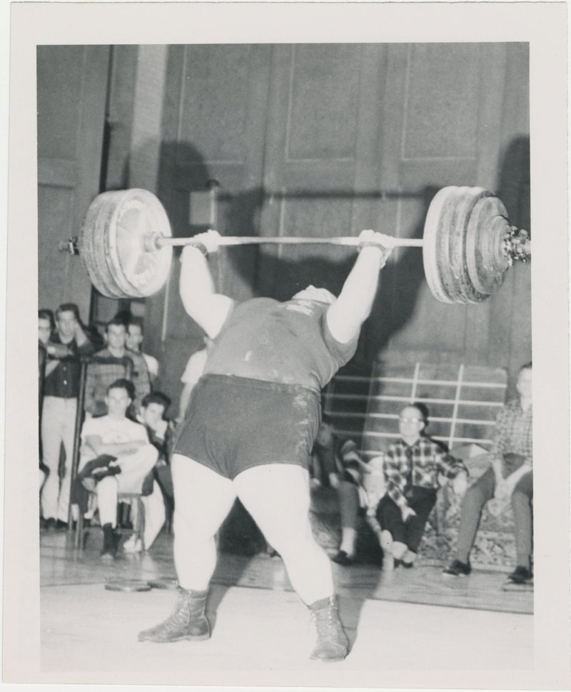 Photo of Paul Anderson performing a press lift Rogue USA